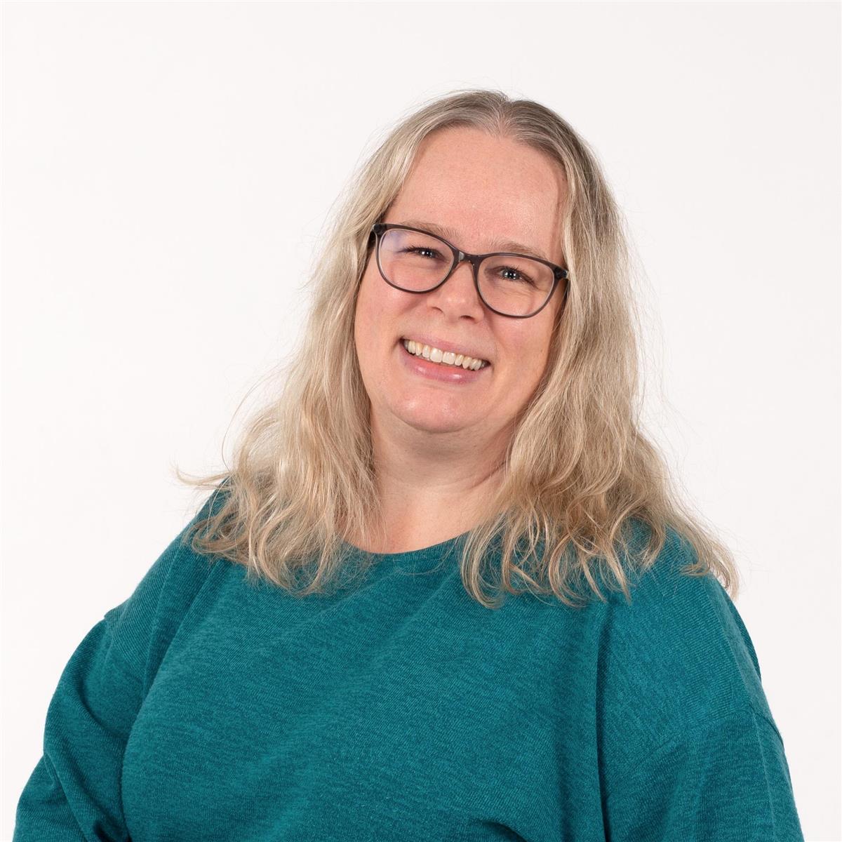 portrett av smilende dame